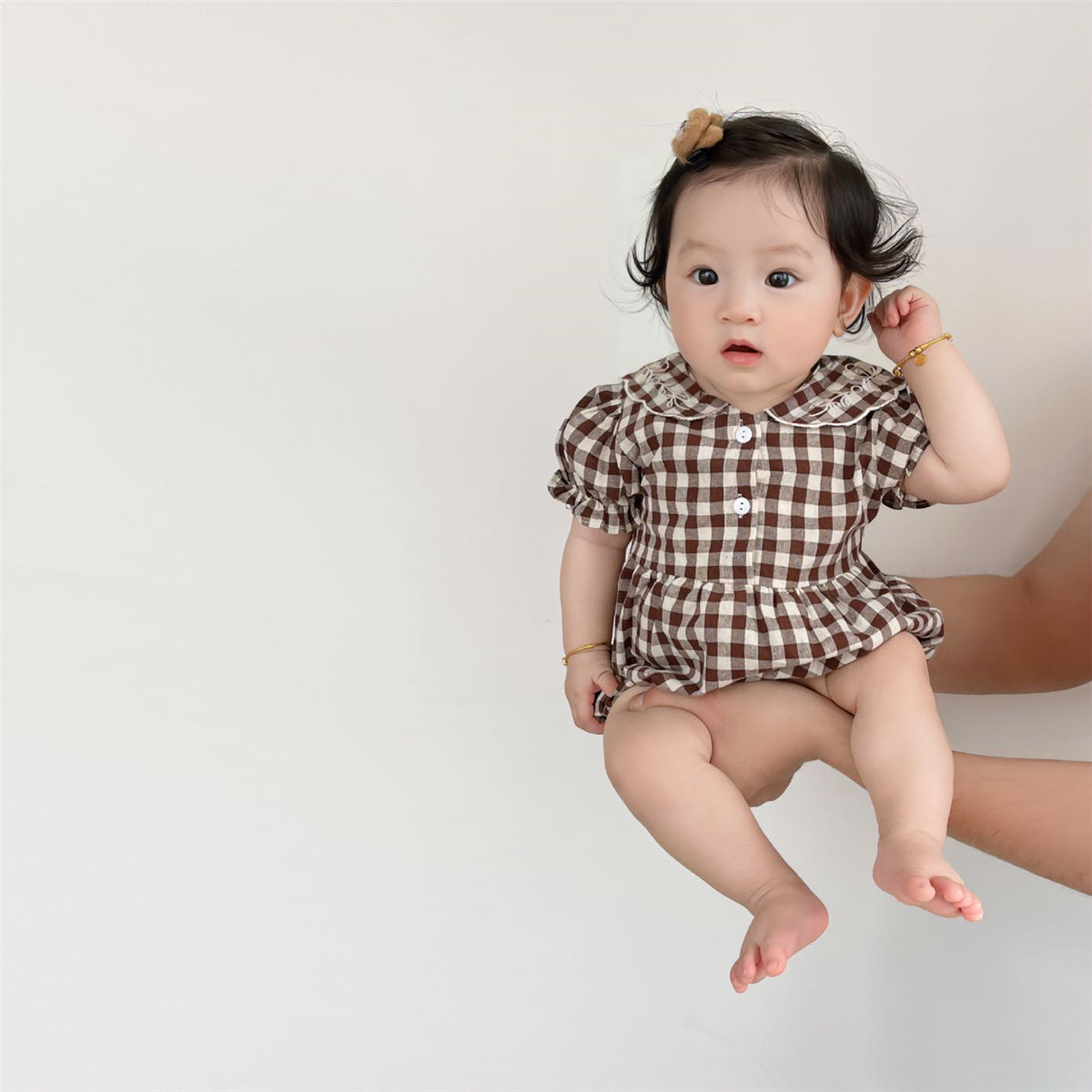 Discover the Charm of Our Baby Embroidered Lapel Plaid Romper
